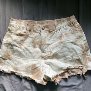 Tan and white tie dye shorts.